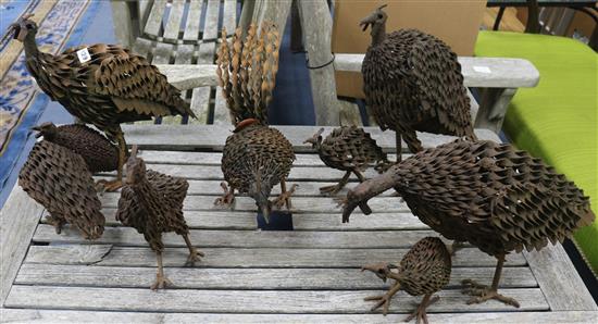 Nine wrought iron models of chickens